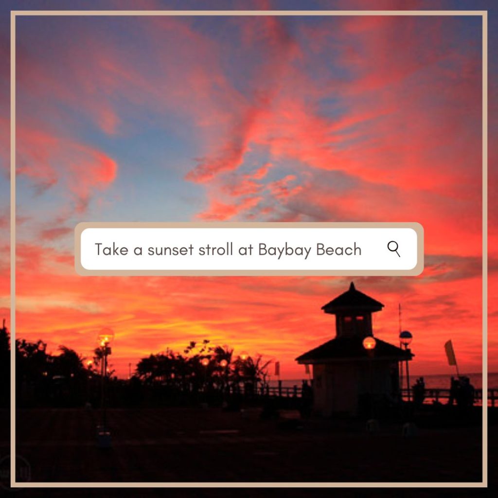 Take a sunset stroll along Baybay Beach